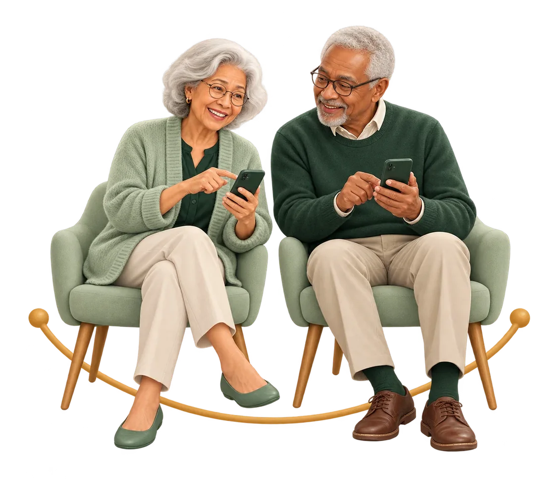 Deux aînés souriants échangent autour de leurs téléphones.